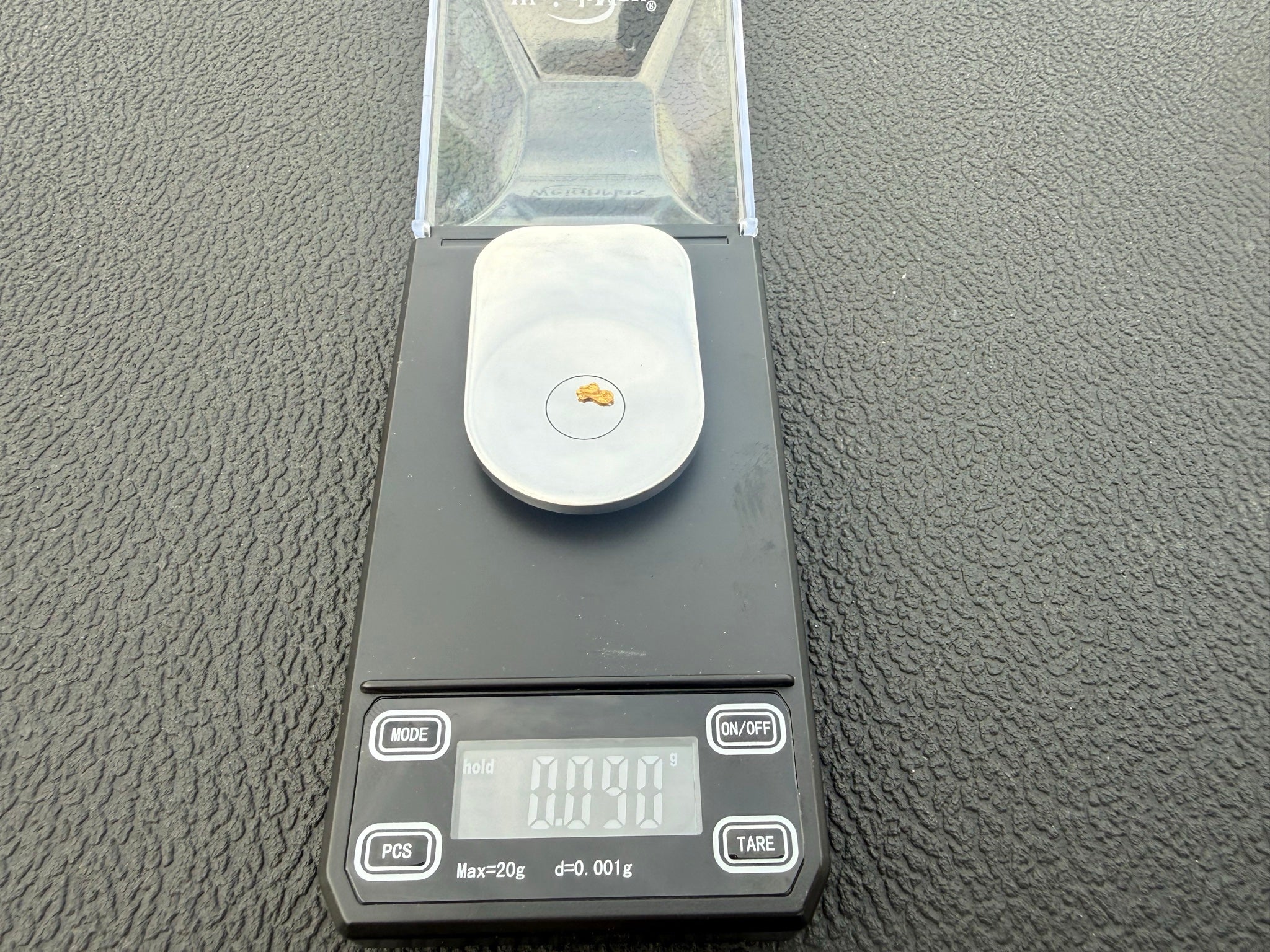 0.090 gram gold on scale, found over 2.5 inches deep in North Carolina with the GPX 6000 and a Coiltek 10x5 Gold Hawk coil