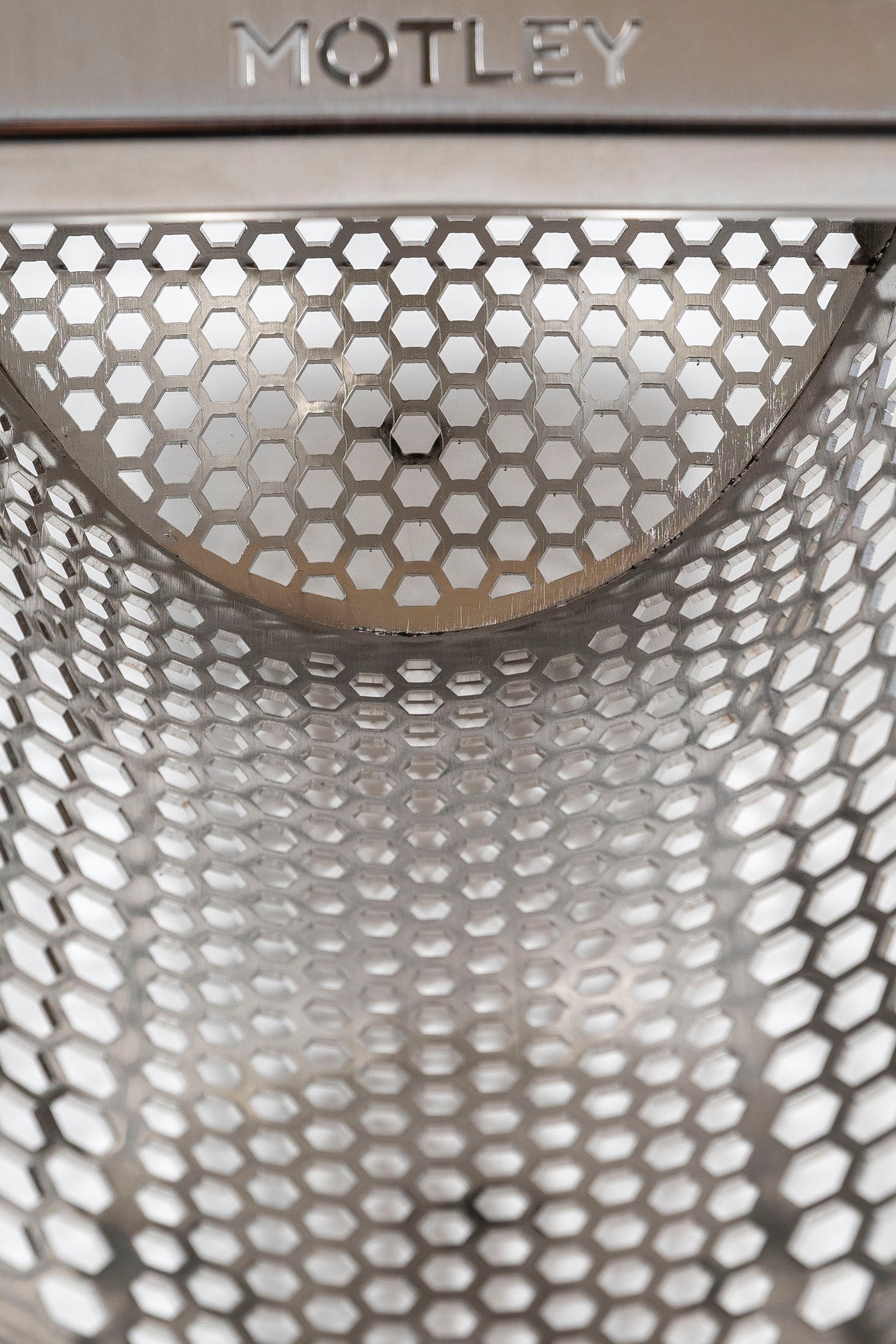Inside the Motley Beach Scoop showing the two lasercut hexagon hole sizes