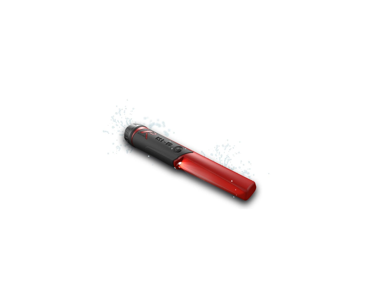 XP MI-6 pinpointer with the LED lit and water droplets: waterproof to 6 m (19.7 ft)