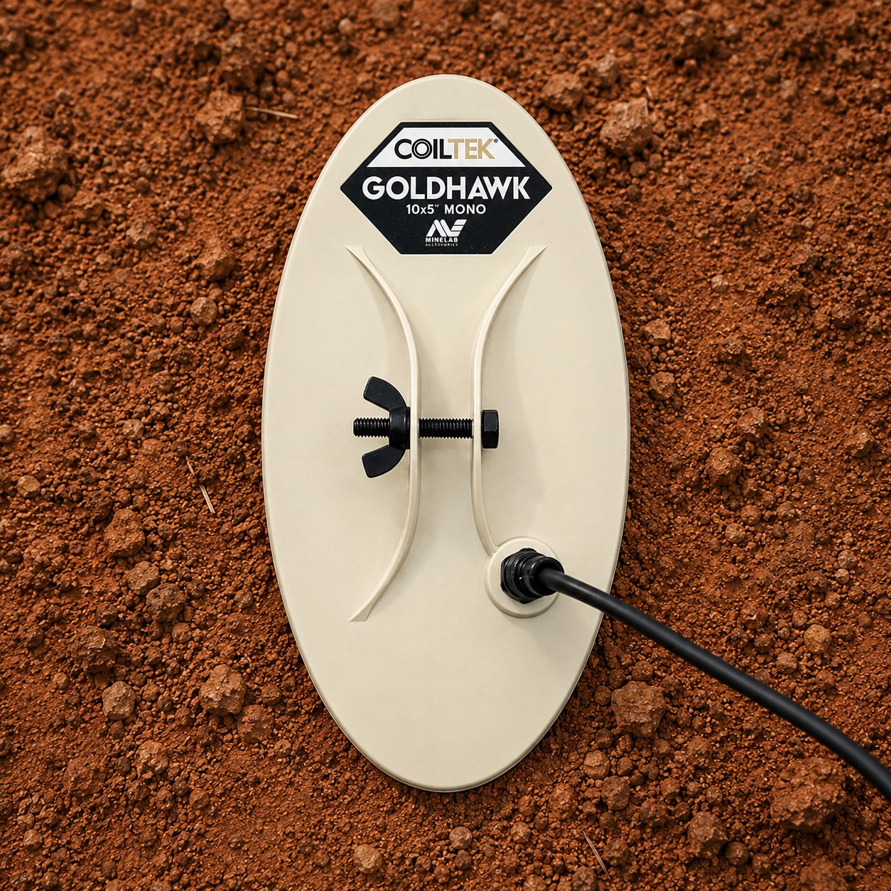 Coiltek Goldhawk 10x5 in mono search coil for the Minelab GPX 6000, shown on mineralized red dirt